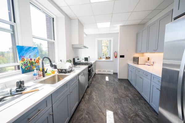 The shared kitchen at Dax House where residents in the all-women’s housing program prepare meals.